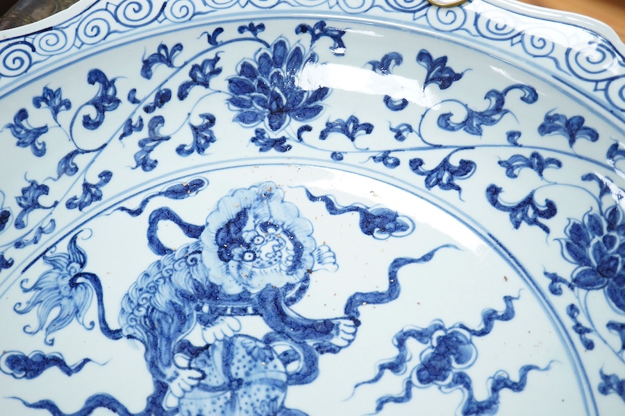 Two large Chinese blue and white chargers, largest 62cm diameter. Condition - good